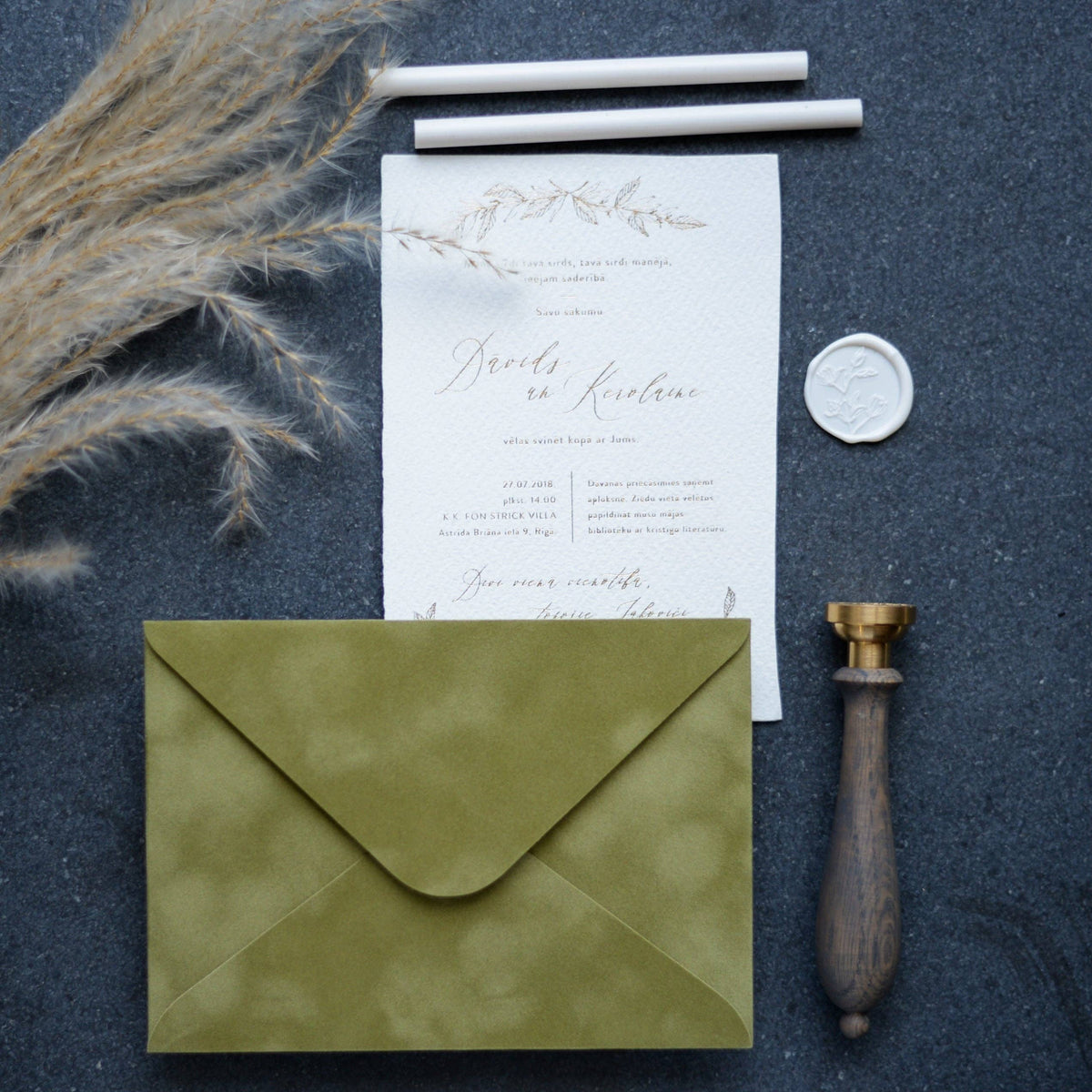 Olive green velvet paper envelope with soft textured surface