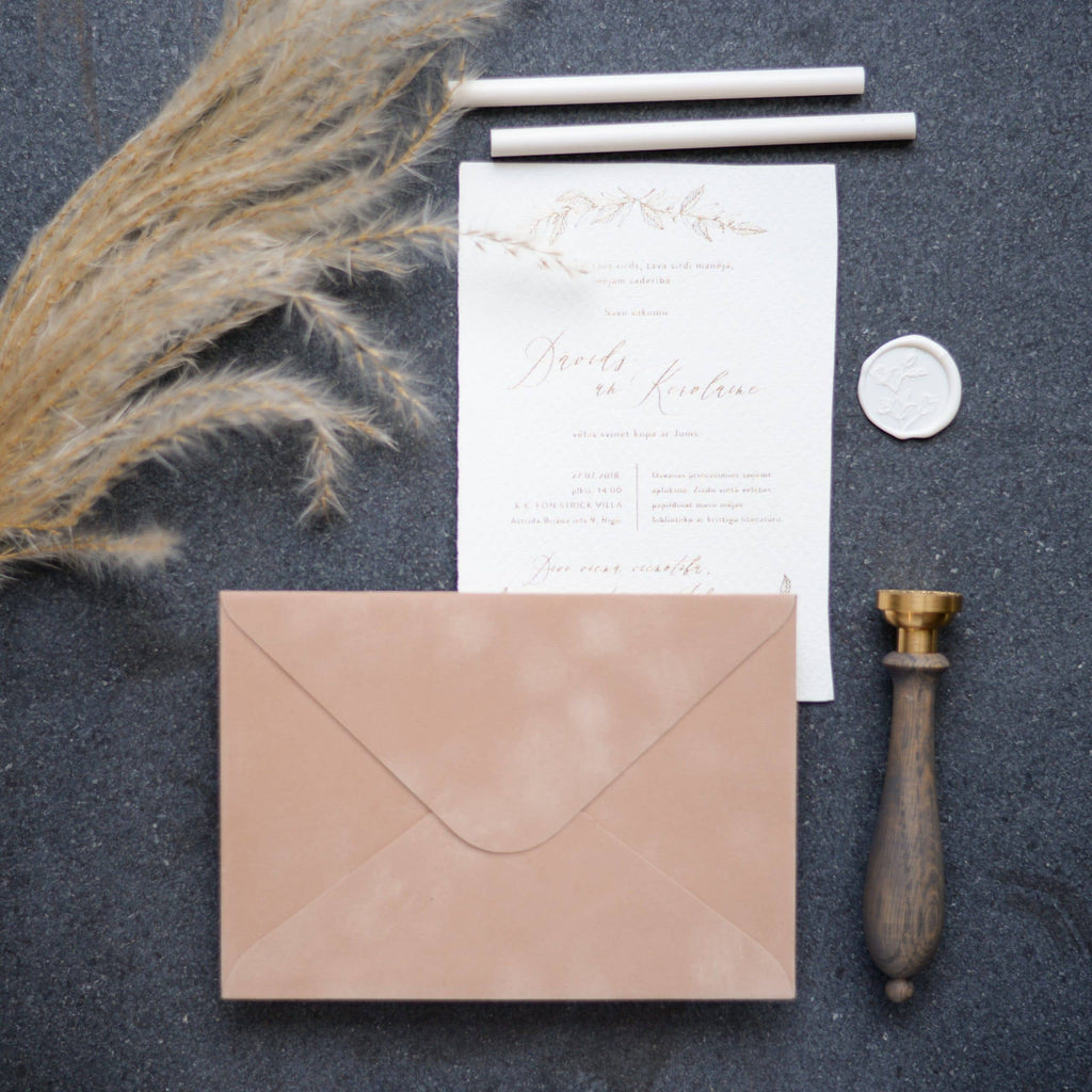 Cream velvet paper envelope with soft textured surface