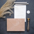 Cream velvet paper envelope with soft textured surface