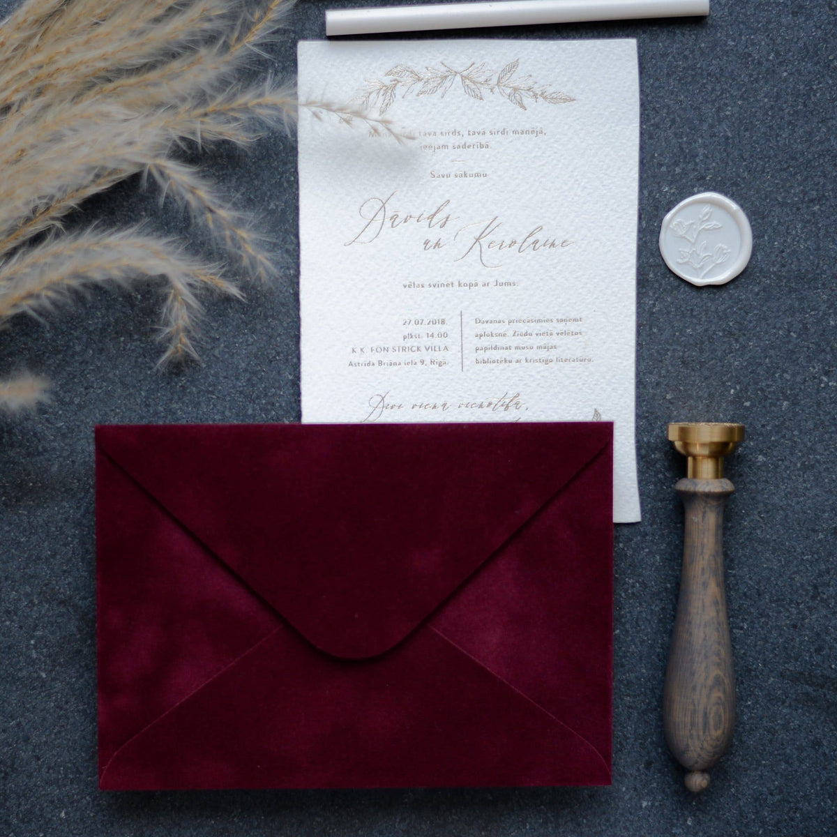 Wine red velvet paper envelope with elegant wedding stationery