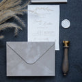 Light grey velvet paper envelope with elegant wedding stationery